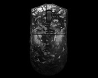A computer mouse with a dark gray and black abstract camouflage pattern, shown from a top-down view against a solid black background.